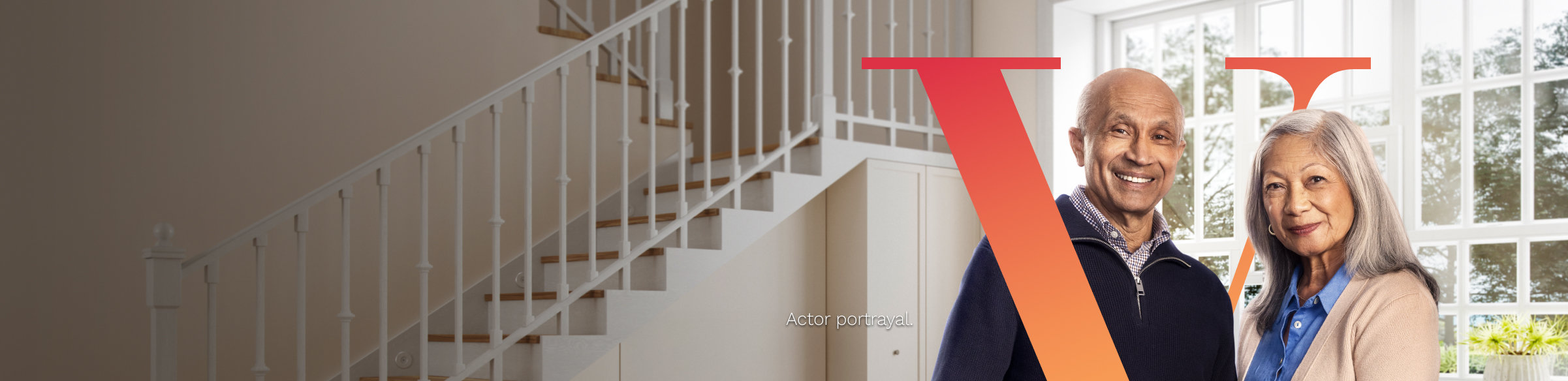 Married couple smiling in their living room, with Pluvicto V.