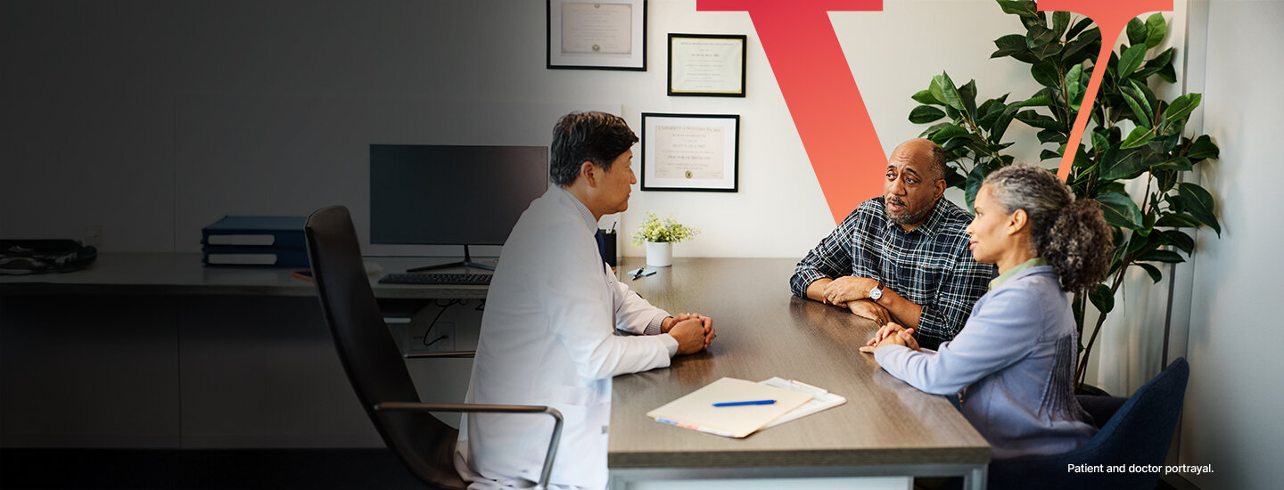 Couple talking to a doctor